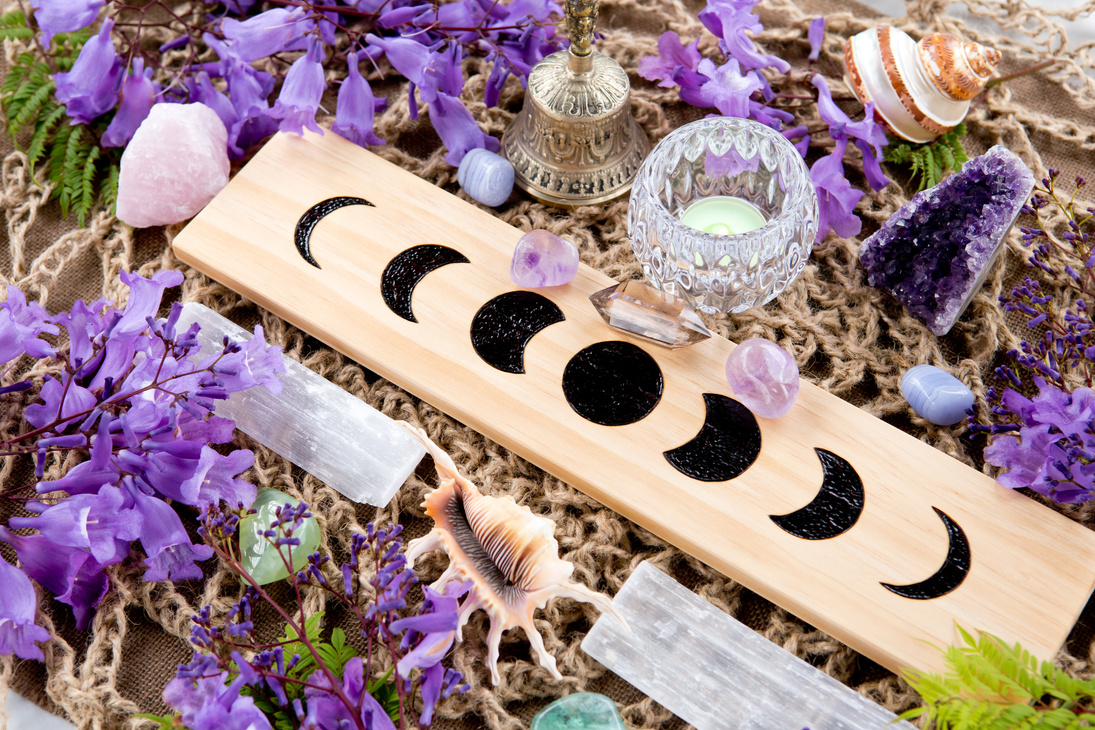 Witch Pagan Moon Phases Altar with crystals and flowers